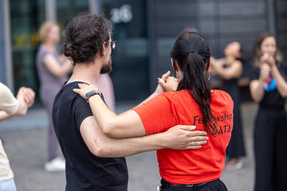 Salsa dancing at the Fellowship of the Data socializing event.