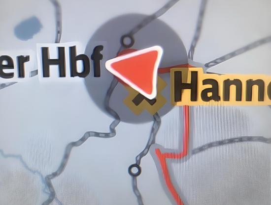 An image of a map highlighting Hannover, Germany, with a red arrow indicating direction. The text includes "Hbf" (central station) and "Hannover."