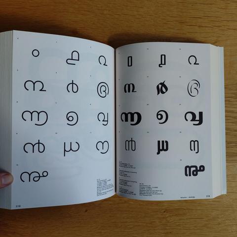 foto einer doppelseite aus dem buch "graphic languages: a visual guide to the world’s writing systems"