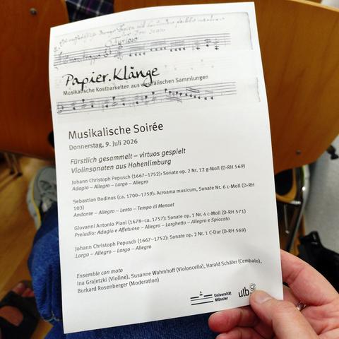 foto eines programmzettels zum konzert "papier.klänge" vom 9.7.2026 an der ULB müsnter