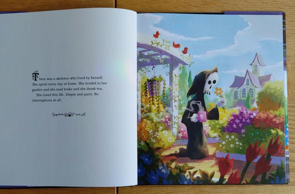 foto einer seite aus dem buch "the skeleton and the cat" von brandon james scott